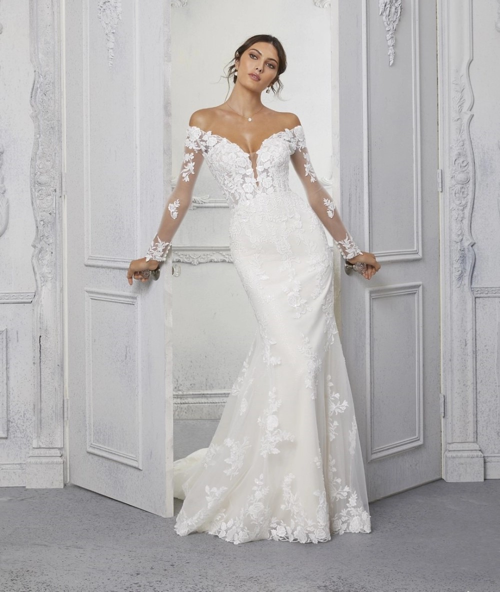 Model wearing a gown by Blu by Morilee