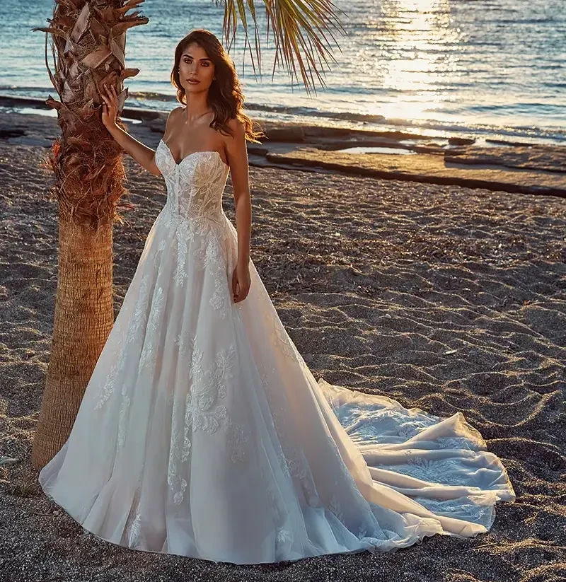 Model wearing a dress by Allure Couture.